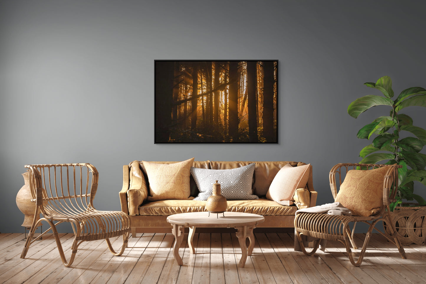 Living room with wicker furniture, a sofa, and a forest painting on the wall of sunlight filtering through trees at sunset in the forest at Long Beach, Tofino, BC. Black float frame.